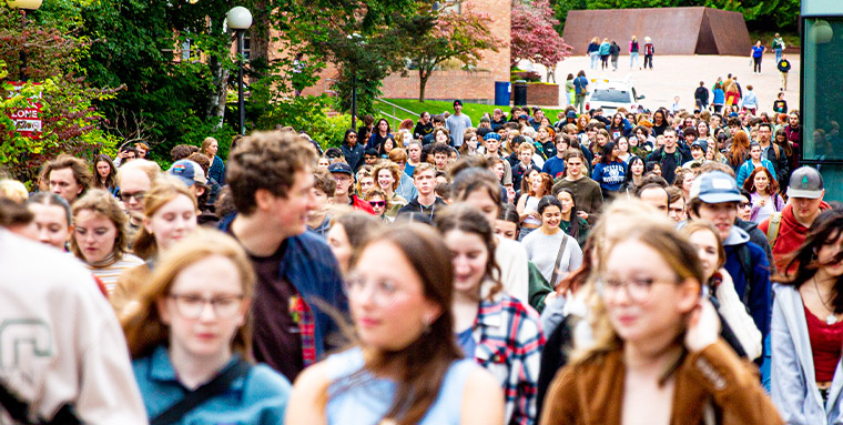 A crowd of Western students going to class