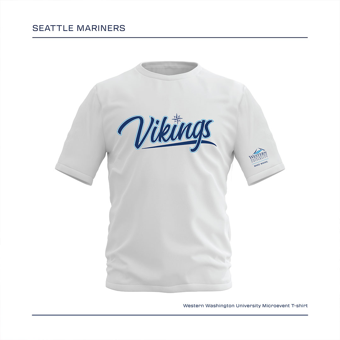 White short sleeved t-shirt with Vikings on the front and the Mariners logo above the "i" with the WWU logo/Make Waves on the left sleeve.